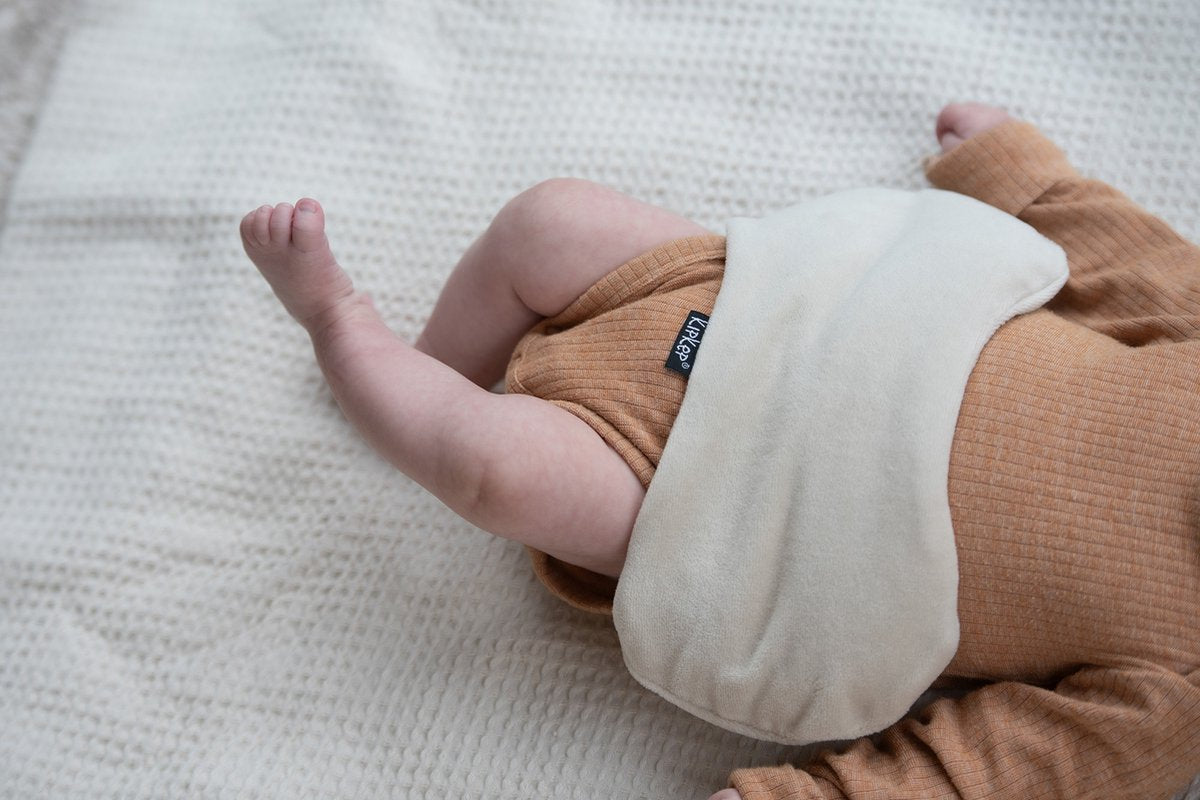 Kipkep woller warmtekussen creme