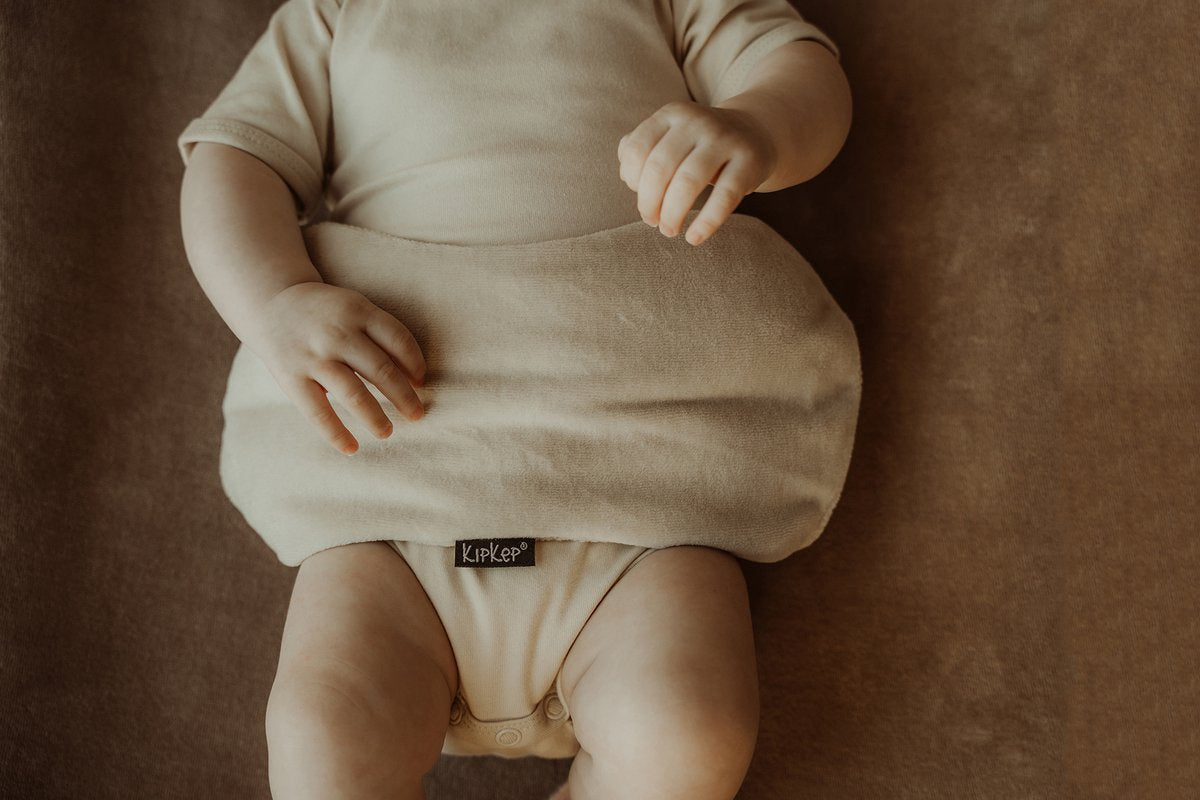 Kipkep woller warmtekussen creme